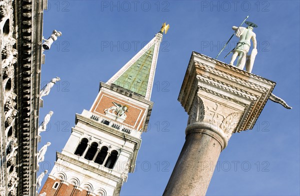 ITALY, Veneto, Venice, "The Campanile in St Mark's Square with the Column of San Teodoro, the original patron saint of Venice, on the right"