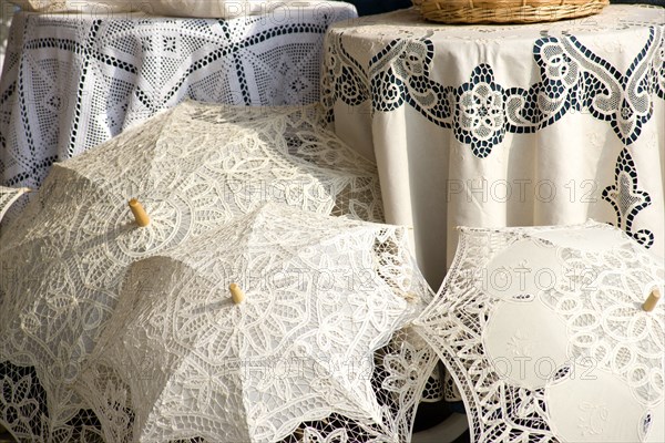ITALY, Veneto, Venice, "Burano, one of the few inhabited islands in the lagoon famous for traditional lace production. Shop display of locally made lace"