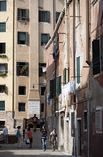 ITALY, Veneto, Venice, "One of the three entrances to the Jewish Ghetto in Cannaregio district. A small bridge, the Ponte de Gheto Novo, at the end of a narrow street leads across a canal into the Ghetto"