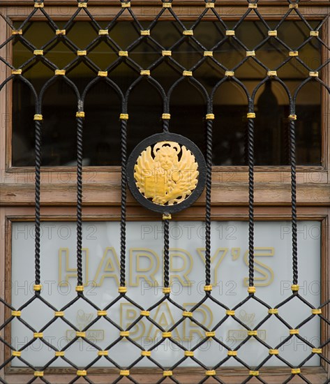 ITALY, Veneto, Venice, "A window of Harrys Bar, home of the Bellini cocktail, beside the Grand Canal."