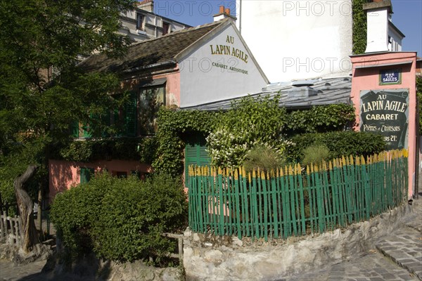 FRANCE, Ile de France, Paris, "Montmartre The rustic exterior of the nightclub Au Lapin Agile, The Agile Rabbit, on Rue des Saules"