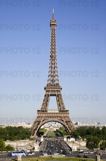 FRANCE, Ile de France, Paris, The Eiffel Tower with traffic crossing the Pont D’Ienta bridge across the River Seine