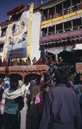 INDIA, Ladakh, Hemis Gompa, Pilgrims wait to see Holy Thangka of Padmasambhava revealed once in twelve years during the Hemis Festival to celebrate the birth of the founder of Tibetan Buddhism.