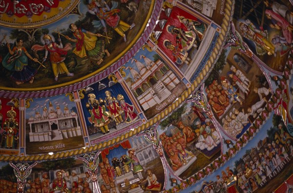 INDIA, Gujarat, Bhuj, Ceiling painting and relief carving in the Swaminarayan Temple.