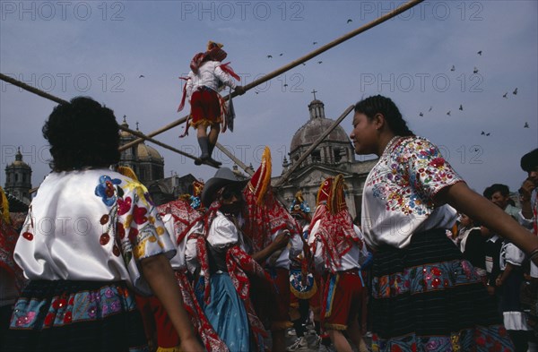 MEXICO, Mexico City, "Our Lady of Guadelope Festival dancers, musicians and acrobats in front of the Basilica."