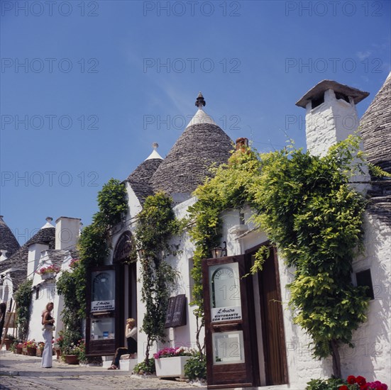 ITALY, Puglia, Alberobello, Traditional Trulli houses.