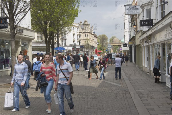 ENGLAND, East Sussex, Brighton, Shoppers in East street.