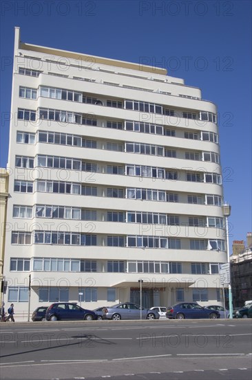 ENGLAND, East Sussex, Brighton, Embassy Court restored Art Deco apartment block on the sea front.