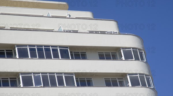 ENGLAND, East Sussex, Brighton, Embassy Court restored Art Deco apartment block on the sea front.