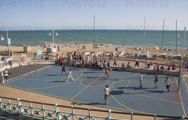 ENGLAND, East Sussex, Brighton, Basketball court on the seafront.