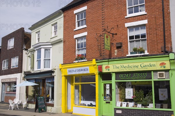 ENGLAND, Hampshire, Emsworth, Row of shops near main square.