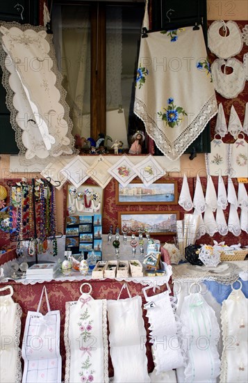 ITALY, Veneto, Venice, A lace shops on the lagoon island of Burano the historic home of the lacemaking industry in the region