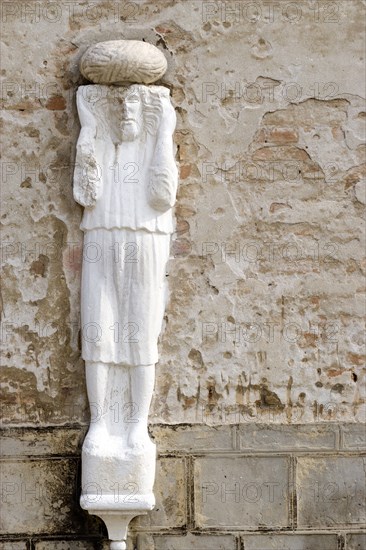 ITALY, Veneto, Venice, "One of the stone Moors in the Campo dei Mori supposedly depicting one of the Mastelli brothers, merchants from the Moorea or Peleponnese"
