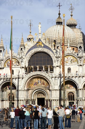 ITALY, Veneto, Venice, Tourists in Piazza San Marco in front of St Marks Basilica