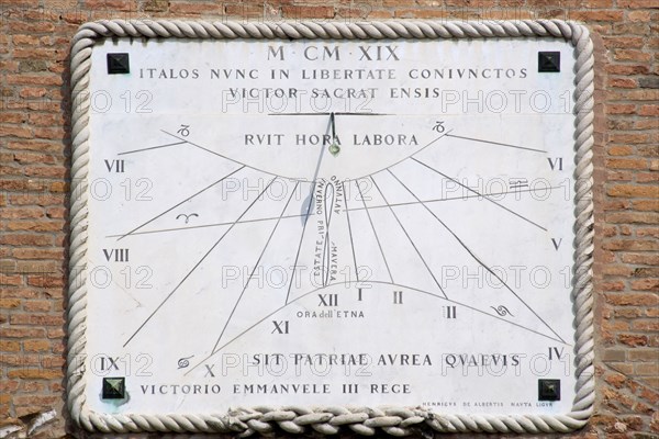 ITALY, Veneto, Venice, A sundial on the wall of the Arsenal with year in Roman numerals and words in Latin