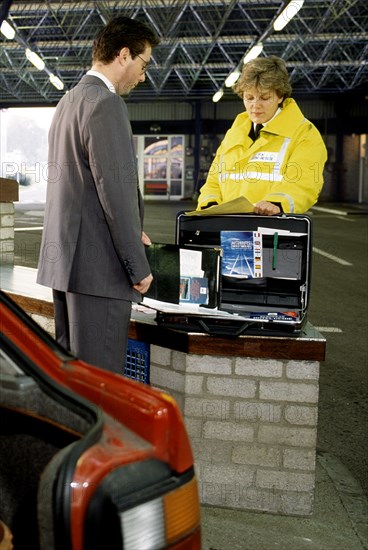 ENGLAND, Kent, Dover, Man going through Customs Check