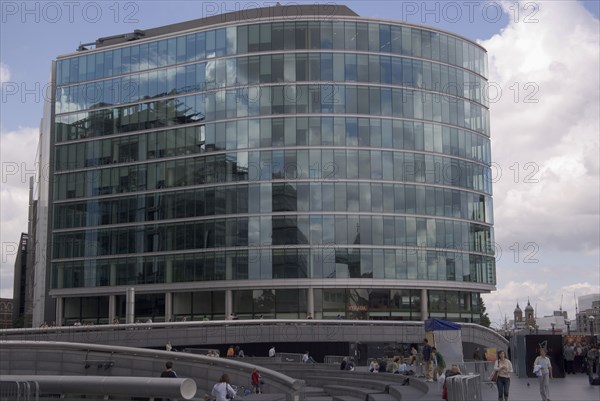 ENGLAND, London, Glass fronted offices on the southbank on the Queens walk next to the GLA City Hall