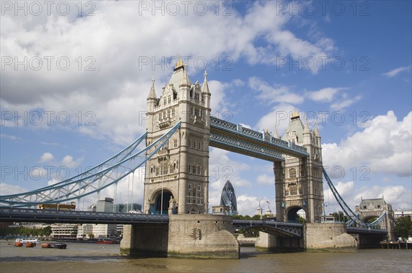 ENGLAND, London, Detail of  Tower Bridge on the River Thames with the Gherkin tower seen through the bridge.