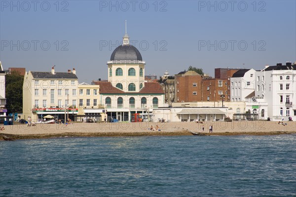 ENGLAND, West Sussex, Worthing, View from the pier across the sea towards The Dome Cinema and Marine Parade cafes