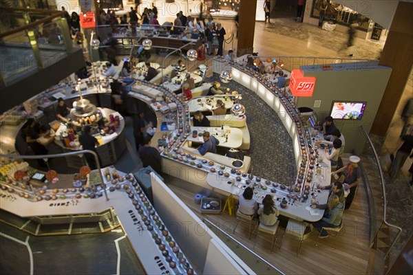 ENGLAND, Kent, Greenhithe, "Bluewater shopping mall, Yo Sushi conveyor Japanese restaurant."