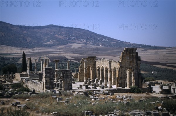 MOROCCO, Meknes, Volubilis, Roman Ruins of  Volubilis and surrounding landscape