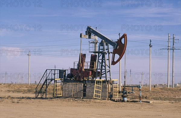 KAZAKHSTAN, Krzloroa, Oil derrick in a rural setting..