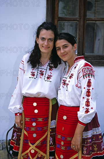 BULGARIA, Veliko Tarnovo, Two girls in national costume.