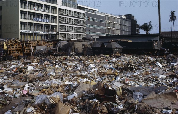 NIGERIA, Lagos, Rubbish dump in centre of modern city.