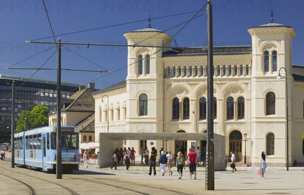 NORWAY, Oslo, City centre tram in front of the Nobel Peace Centre on Aker Brygge.