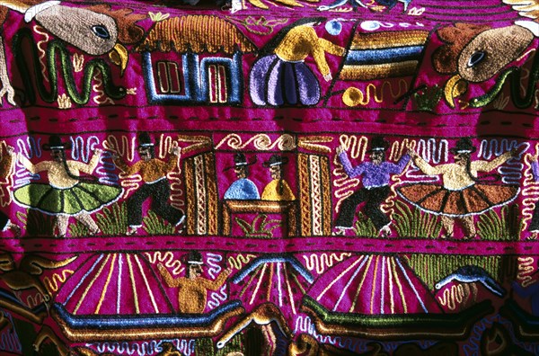 PERU, Near Cusco, Ollantaytambo, "Colourful patterned embroidered cloth in the market, Ollantaytambo, Sacred Valley of the Incas."