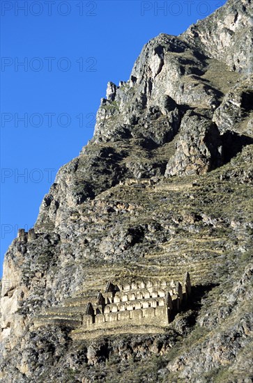 PERU, Near Cusco, Ollantaytambo, "Granary or grain silo on Pinkuylluna Mountain, Sacred Valley of the Incas."