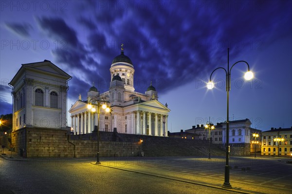 FINLAND, Helsinki, "The Tuomiokirkko (Lutheran Cathedral) in Senate Square during the ""White Nights"" of mid June. "