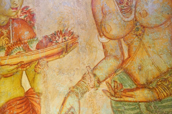SRI LANKA, Sirgiriya, "Detail of The Sigiriya Damsels. The 5th-century frescoes, believed to represent celestial nymphs, are found in a sheltered niche halfway up Lion Rock."