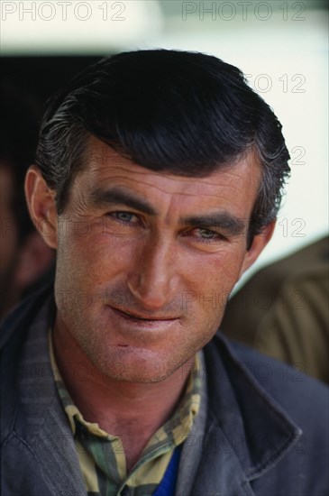 ARMENIA, Yerevan, Head and shoulders portrait of Armenian man at Yerevan market