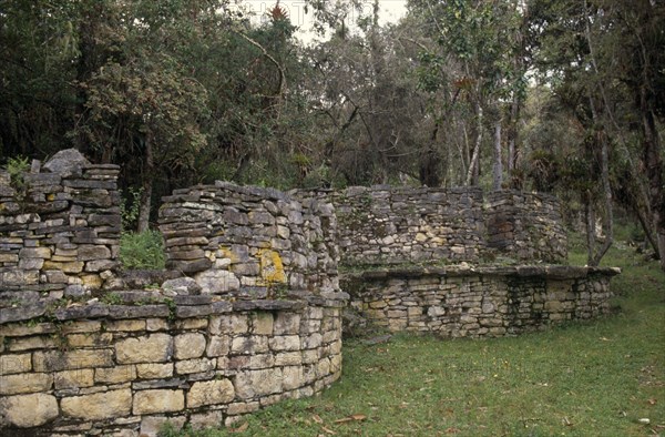 PERU, Amazonas, Chachapoyas, "Kuelap Fortress ruins, Chachapoyas culture also known as the Cloud Forest People.  Site discovered 1843.  Remains of circular stone walls."