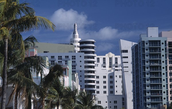 USA, Florida, Miami, South Beach. Old meets new; Art Deco and modern architecture dominate the skyline at the north end of Ocean Drive.