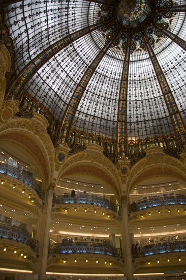 FRANCE, Ile de France, Paris, The Art Nouveau central glass dome and balconies of the Galeries Lafayette department store