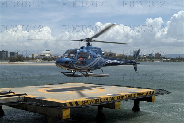 Australia, Queensland, Gold Coast, Seaworld's sightseeing helicopter coming in to land.