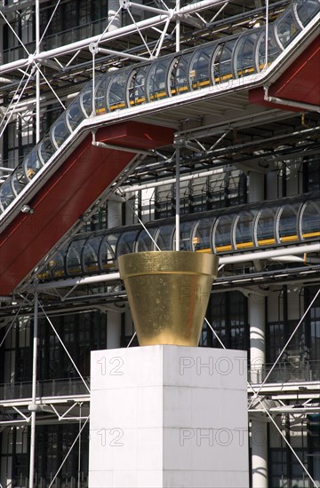 FRANCE, Ile de France, Paris, The gilded sculpture Le Pot Dore by Jean-Pierre Raynaud in the Place Georges Pompidou in front of the Pompidou Centre in Beauborg Les Halles