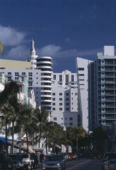 USA, Florida, Miami, South Beach. Old meets new; Art Deco and modern architecture dominate the skyline at the north end of Ocean Drive.