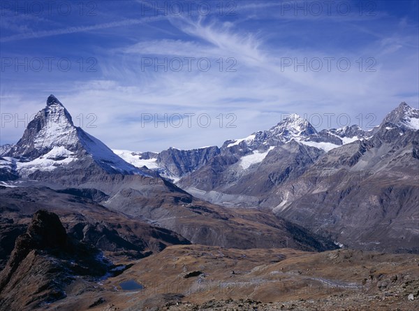 SWITZERLAND, Valais, Matterhorn , "View from Gornergrat towards snow capped mountains left to right, Matterhorn 4478 metres ( 14665 ft) Dent Blanche 4357 metres ( 14269 ft) Obergabelhorn 4063 metres ( 13306 ft )"