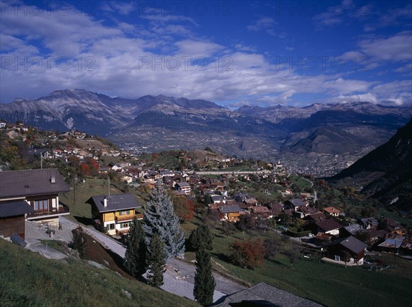 SWITZERLAND,  Valais, Vex, View over the rooftops of the village. South of Sion in the Rhone Valley.