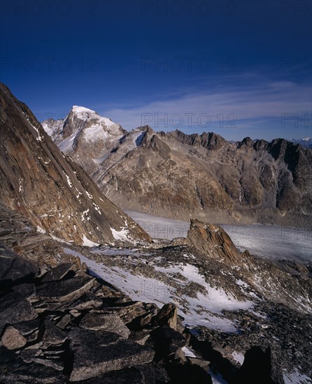 SWITZERLAND, Valais, Rhone Glacier, Glacier seen from Nagelisgratli path. Fukahorn Ridge beyond. Snow covered Galenstock 3584metres (11744ft) on the left.