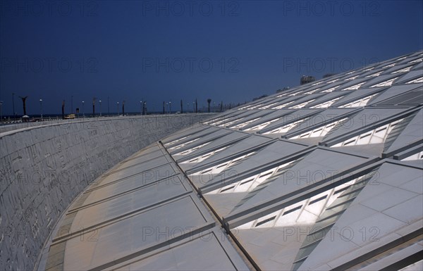 EGYPT, Nile Delta, Alexandria, "Bibliotheca Alexandrina modern library with detail of  interlocking panelled roof and walls made of grey Aswan granite carved with letters, characters and symbols from every known alphabet in the world. "