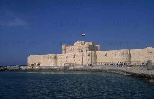 EGYPT, Nile Delta, Alexandria, Fort Qaitbey seen from across water