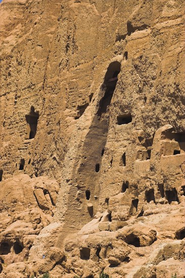 AFGHANISTAN, Bamiyan Province, Bamiyan , Empty niche in cliffs where the famous carved large Budda once stood 180 foot high before being destroyed by the Taliban in 2001