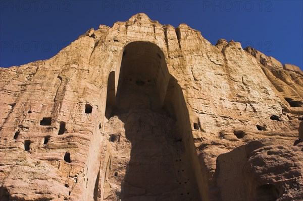 AFGHANISTAN, Bamiyan Province, Bamiyan , Empty niche in cliffs where the famous carved large Budda once stood 180 foot high before being destroyed by the Taliban in 2001