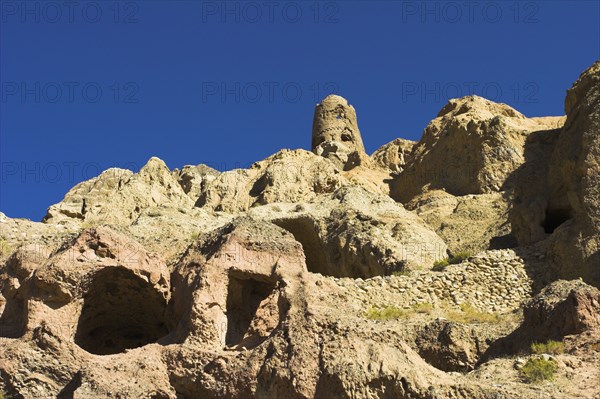 AFGHANISTAN, Bamiyan, Kakrak valley, "Watchtower at ruins once the site of a 21ft standing Buddha in a niche, discovered in 1030 and surrounded by caves whose Buddhists paintings thought to date from the 9th and 9th Centuries AD but removed by French archaeologists and put in the National musuem in Kabul "