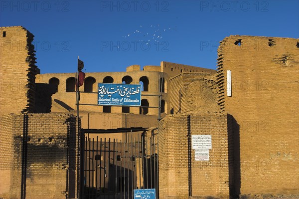 AFGHANISTAN, Herat, "The Citadel (Qala-i-Ikhtiyar-ud-din) Originally built by Alexander the Great but built in it's present form by Malik Fakhruddin in 1305 A.D. Conquerors Ghegnis Khan and Tamerlane fought beneath its walls and it suffered attacks by the Ghaznavids, the Seljuks, the Ghorids, the Monghuls, the Timurids the Safavids and others. Now managed by the department of Historical monuments of the Ministry of Information, Culture and Tourism Jane Sweeney"