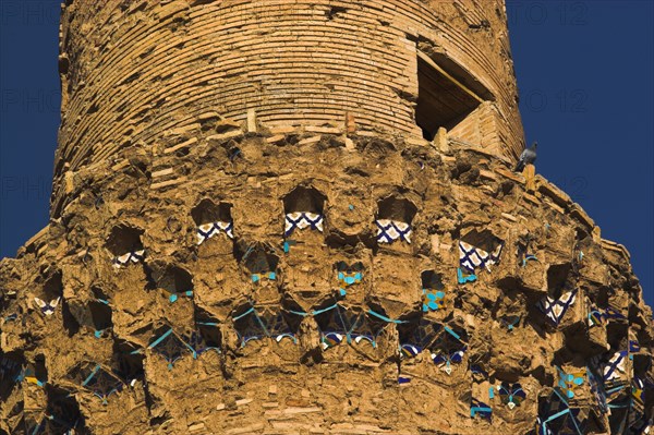 AFGHANISTAN, Herat, "The Mousallah Complex, Minaret One of several minarets in this complex, this one stands by Gaur Shad 's Mausoleum with a mortar hole in it, ,another one also near the mausoleum is partly destroyed and four stand marking the corners of the long gone Madrassa built by Sultan Husain Baiquara last of the Timurid rulers Six other minarets were demolished by British troops in 1885, and 3 were destroyed by earthquake"